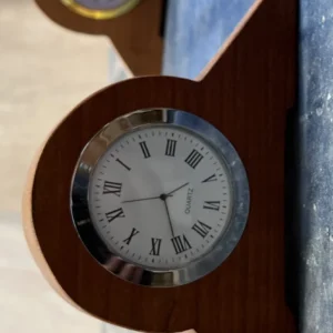 A mantle clock made by veterans in American cherry wood.